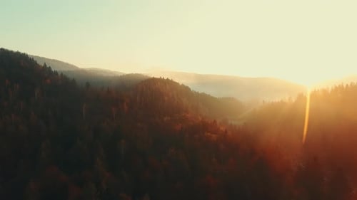 Orange Sunset Sky Over Mountain Valley