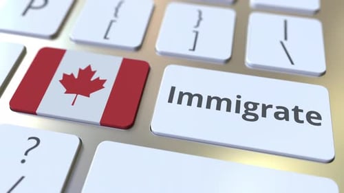 Canada Immigrate Button Press on Computer Keyboard