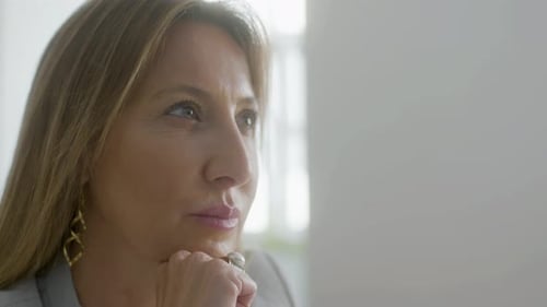 Adult Woman Thinking and Looking to the Side