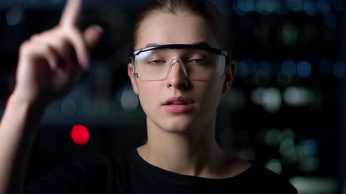 Successful Pretty Girl Wearing VR Glasses Indoors
