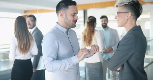 Picture of Architects Talking About Project in Hall