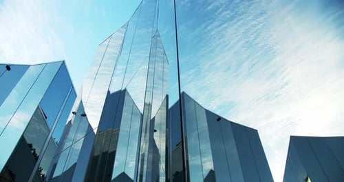 Clouds Reflected in the Glass Surfaces of Modern Structure with Reflective Mirror Surfaces