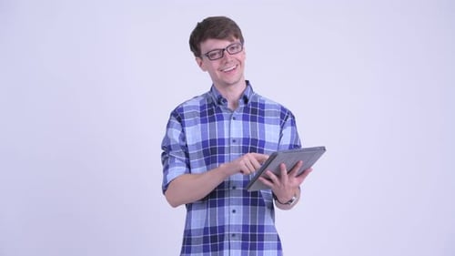 Man Using Tablet Device in Studio Setting