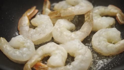 Raw Shrimp Cooking in Pan Close Up
