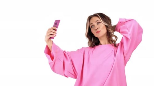 Young Woman Posing For a Selfie on White