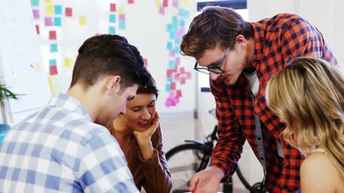 Creative Team Collaborating in Modern Office Environment