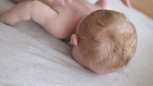Infant Back Massage at Home, Close Up