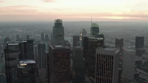 Breathtaking Wide Shot Backing Up From Downtown Los Angeles, California Skyline at Sunset