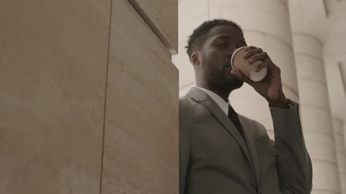 Handsome Young Man Having Coffee Break