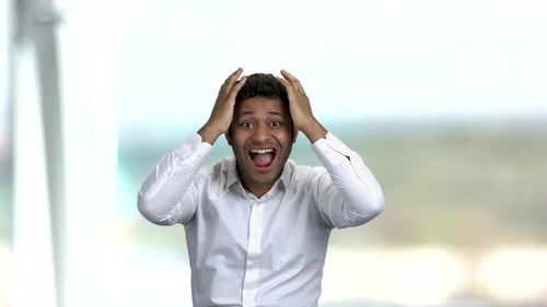 Enthusiastic Man Celebrates Success and Achievement