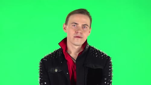 Guy Stands Waiting with Boredom. Green Screen