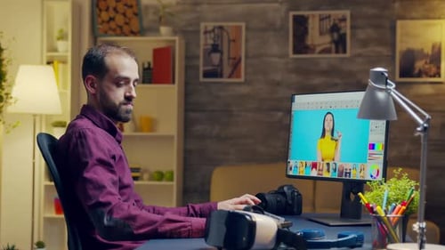 Photo Editor Using VR Headset at Computer