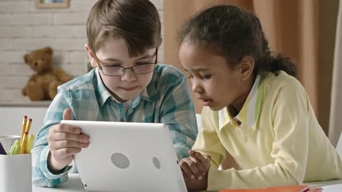Schoolchildren Working with Tablet