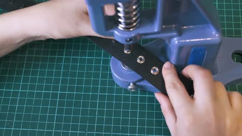 Attaching Metal Rings to a Black Belt