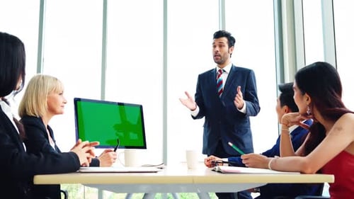 Business People in the Conference Room with Green Screen