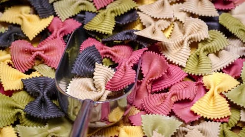 Vibrant Bow Tie Pasta with Metal Scoop