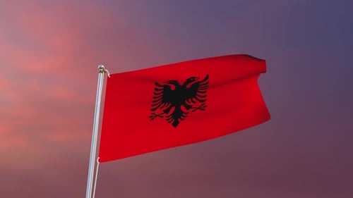 Albania Flag Waving in the Wind against a Gradient Sky
