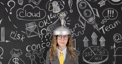 Young Person Wearing Lightbulb Invention Hat