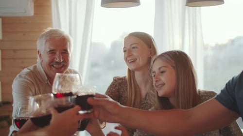 Family Celebrates Together with a Wine Toast