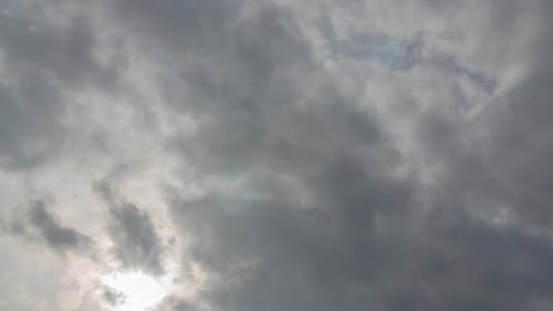 Timelapse Cloudy Heaven Clouds Moving Fast and Lit with Bright Sunlight Sunbeams