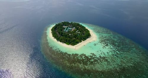 Aerial drone view of scenic tropical islands in the Maldives.