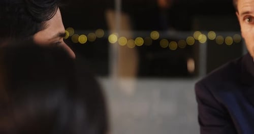 Business Meeting with Financial Data on Tablet