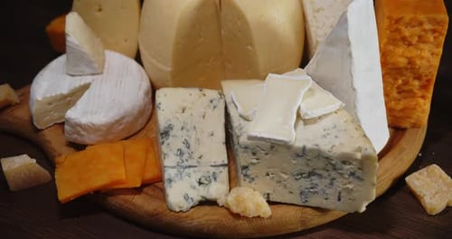 Assorted Cheeses on a Cutting Board
