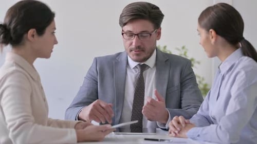 Business Meeting in Bright Workplace