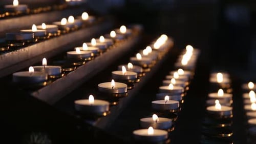 Lighted Candles in the Temple in the Twilight