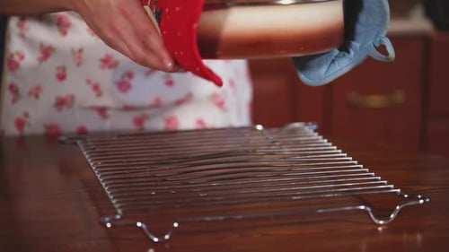 Cook Is Getting Baking Cake From Baking Dish in Kitchen