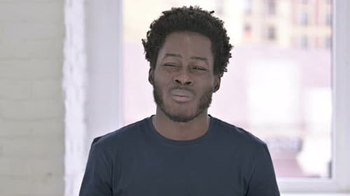 Portrait of Sick Young African American Man Having Toothache
