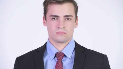 Close Up Of A Young Adult In Suit
