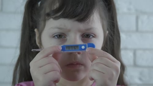 Child with temperature.