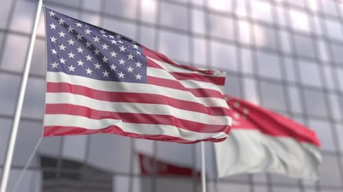 Waving Flags of the United States and Singapore