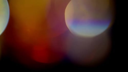 Multicolored Light Leaks Footage on Black Background Lens Flare Leak Burst Overlays Transitions