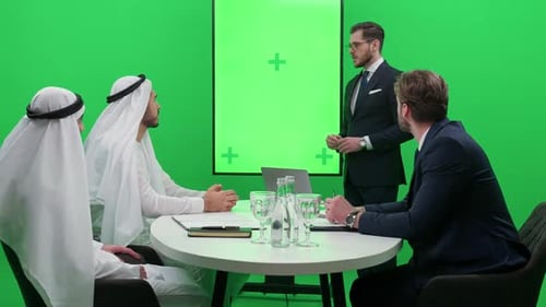 Men in Business Meeting in Chroma Key Studio
