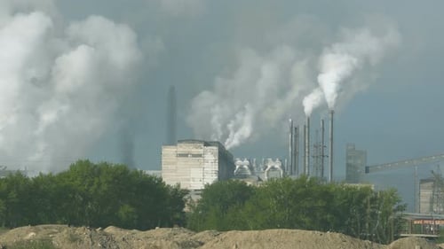 Factory Pipes Smoke In Green Field