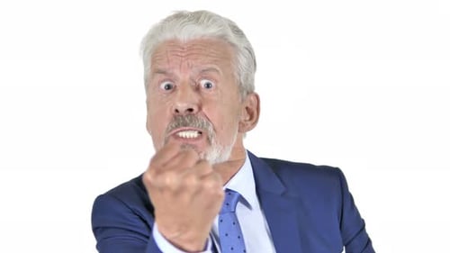 Angry Man Gesturing Assertively in Blue Suit