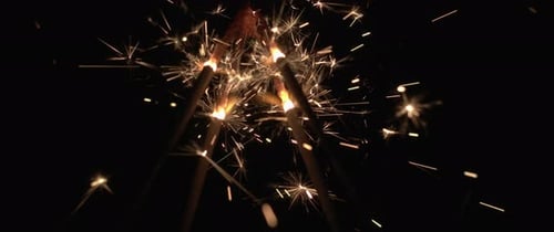 Sparkling Sparklers Ignited in the Dark of Night