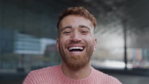 Man Smiling and Laughing Close Up in City