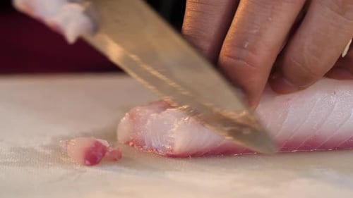 Cutting Fresh Fish Fillet for Meal Preparation