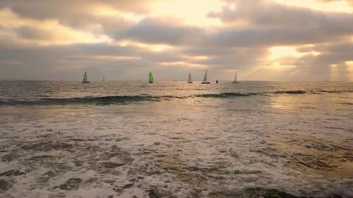 Sailboats at Sea During Golden Hour
