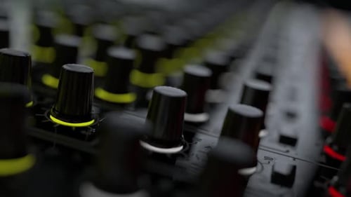 Digital Audio Mixer Control Panel with Pulsing Lights