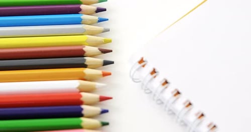 Colored pencils with spiral book