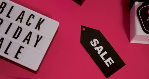 Black Friday Sale Promotional Advertisement on Pink Background
