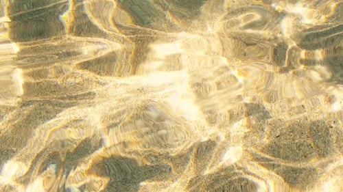 Abstract Sunlight Ripples on Sandy Ocean Bottom