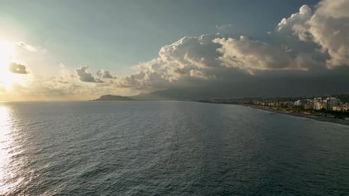 Beautiful Cloudy Sunset Over the Sea Aerial View