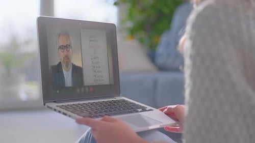 Online Education Video Call with Tutor on Laptop