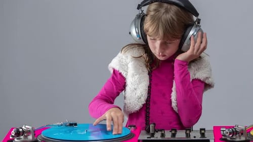 Young Girl DJ Scratching on Turntable