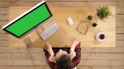 Professional Call Center Operator Working in Casual Office. Green Screen Mock-up Display.